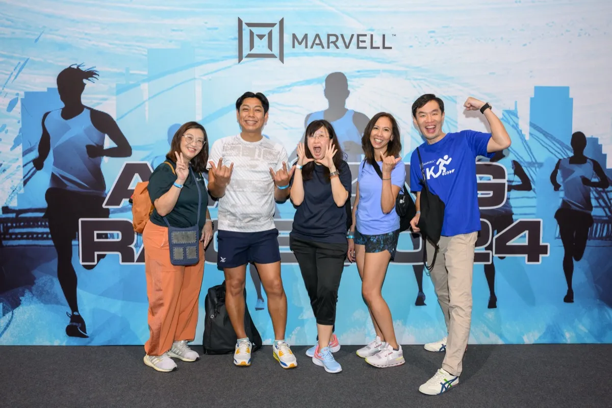 Amazing Race Singapore team building — corporate group at Marina Bay checkpoint