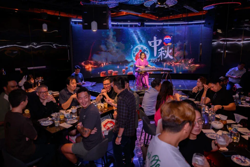 Chinese New Year company dinner Singapore — festive corporate celebration with banquet and entertainment