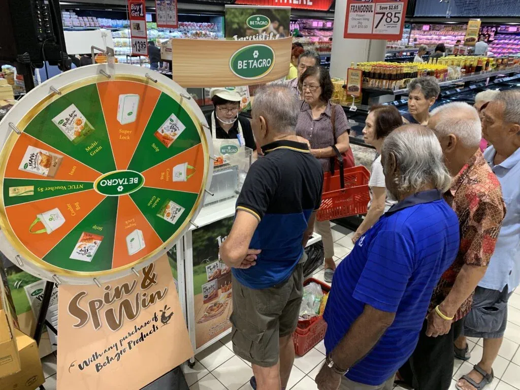 FMCG brand activation event Singapore with product sampling and interactive booths